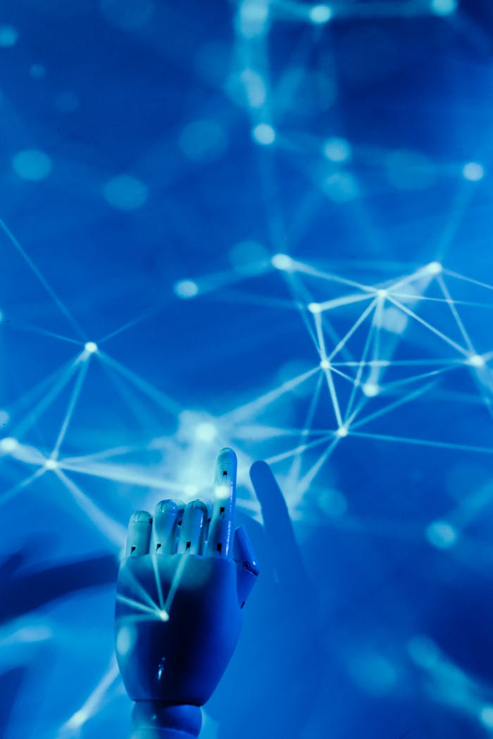 Principes Futuristic robotic hand touching a digital network on a blue background.