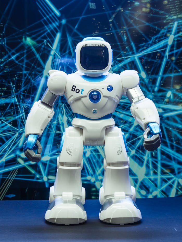 Veille & Innovation Futuristic humanoid robot against a blue network pattern backdrop, showcasing modern technology.